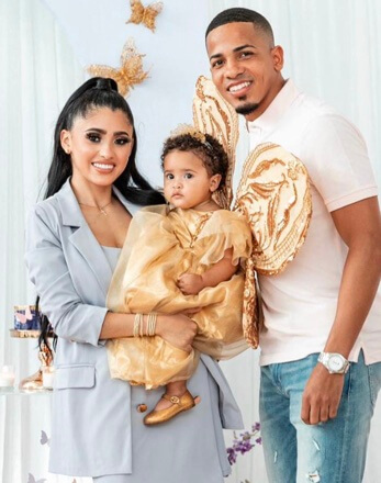 Felix Verdejo with his wife and their daughter.